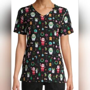 SCRUBSTAR SCRUB TOP W/2 POCKET. BLACK W/MULTICOLORED CHRISTMAS DESIGN. SIZE: 2XL